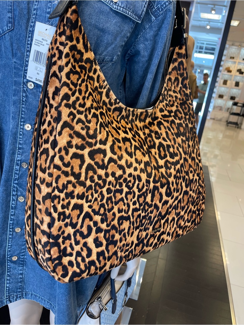 Michael Kors Nolita Large Leopard Print Calf Hair Hobo Shoulder Live Style
NWT - Picture 15 of 16